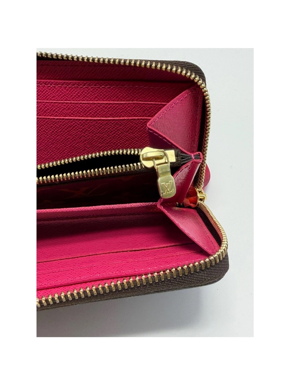 Louis Vuitton Brown Monogram Clemence Zip Wallet with Fuschia interior. - Picture 3 of 7